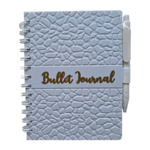Bullet journal personalizado con diseño colorido y nombre, ideal para organización creativa